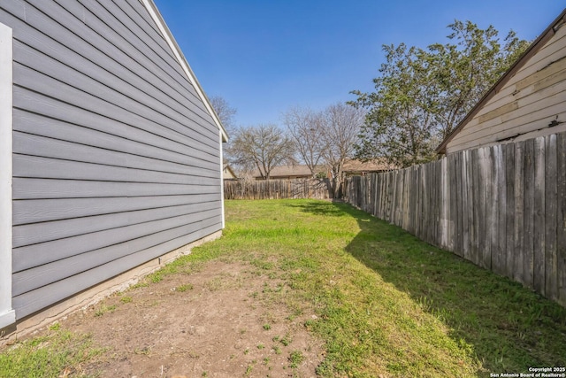 view of yard featuring a fenced backyard