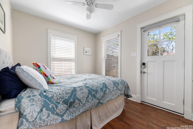 bedroom featuring dark wood-type flooring and ceiling fan