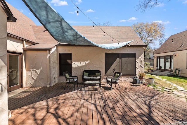 deck with an outdoor living space