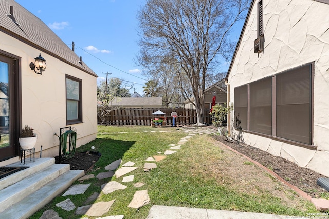 view of yard with fence