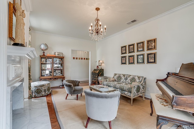 living room with baseboards, visible vents, a chandelier, and ornamental molding