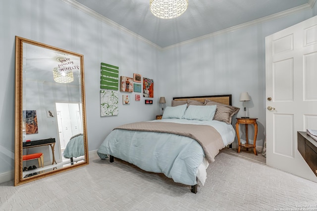 carpeted bedroom with baseboards and ornamental molding