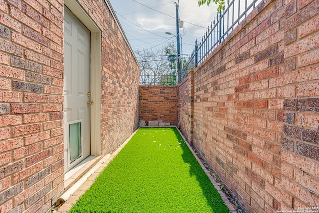 view of yard with fence