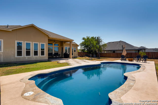 view of swimming pool with a patio, a fenced backyard, and a fenced in pool