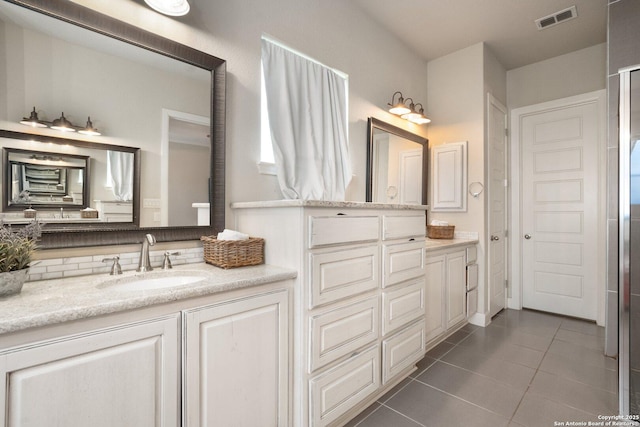 3234 Lilly Flower, San Antonio, TX 78253 - full bath with decorative backsplash, vanity, tile patterned flooring, and visible vents