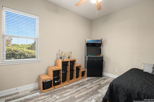 3234 Lilly Flower, San Antonio, TX 78253 - bedroom featuring wood finished floors, ceiling fan, baseboards, and vaulted ceiling