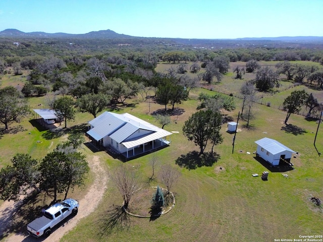 bird's eye view with a mountain view and a rural view