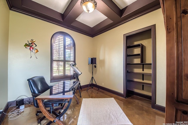 office space featuring beam ceiling, crown molding, baseboards, and coffered ceiling