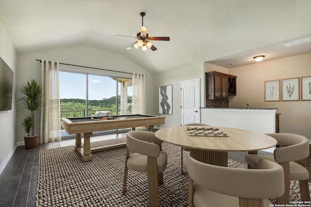 dining area featuring a ceiling fan, baseboards, pool table, vaulted ceiling, and dark wood-type flooring