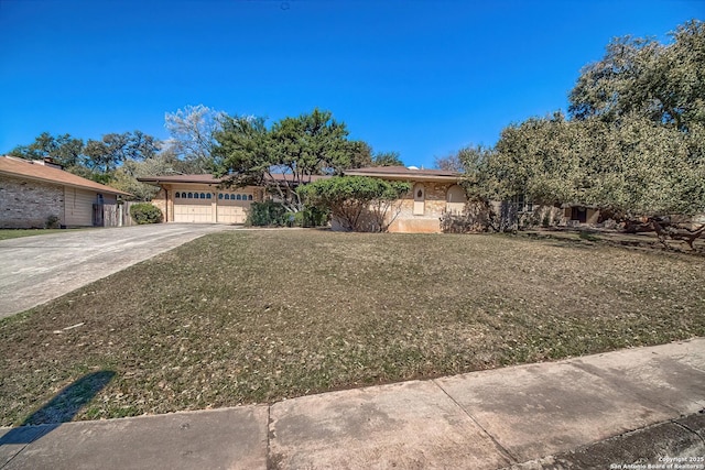 view of front of house with an attached garage and concrete driveway