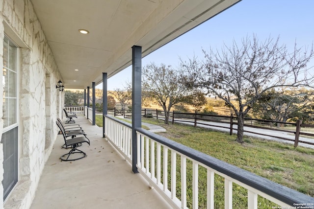 balcony featuring a porch