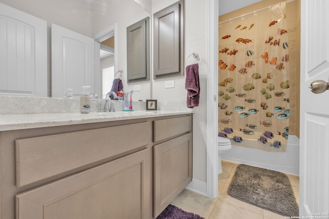 full bathroom featuring tile patterned floors, toilet, shower / tub combo with curtain, and vanity