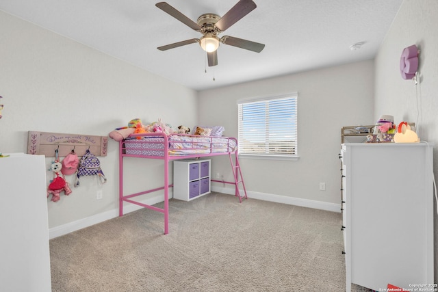 bedroom with carpet flooring, ceiling fan, and baseboards