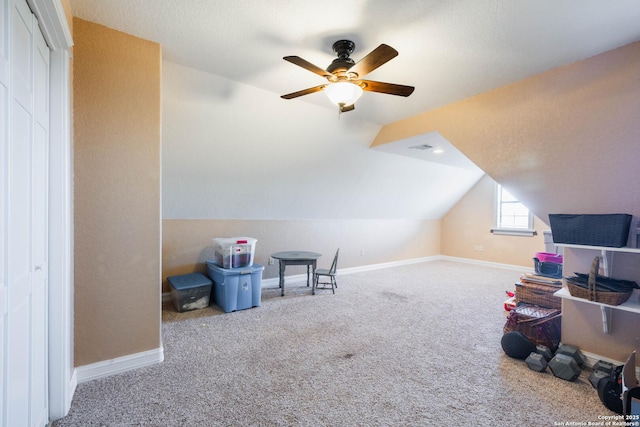 bonus room with baseboards, carpet, a ceiling fan, and vaulted ceiling