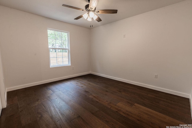 unfurnished room featuring ceiling fan, baseboards, and dark wood finished floors