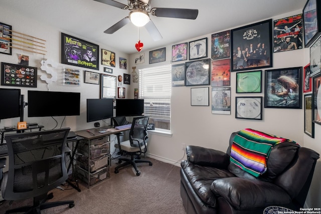 home office with baseboards, carpet floors, and a ceiling fan