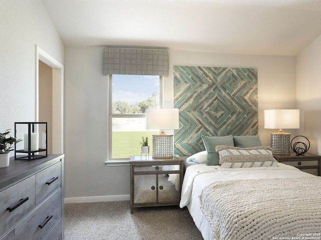 bedroom featuring baseboards and carpet floors