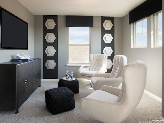 living room with carpet flooring and baseboards