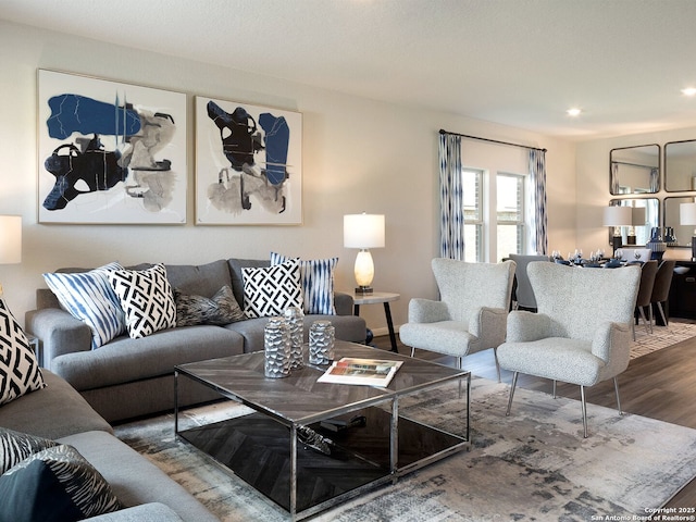 living room featuring recessed lighting and wood finished floors