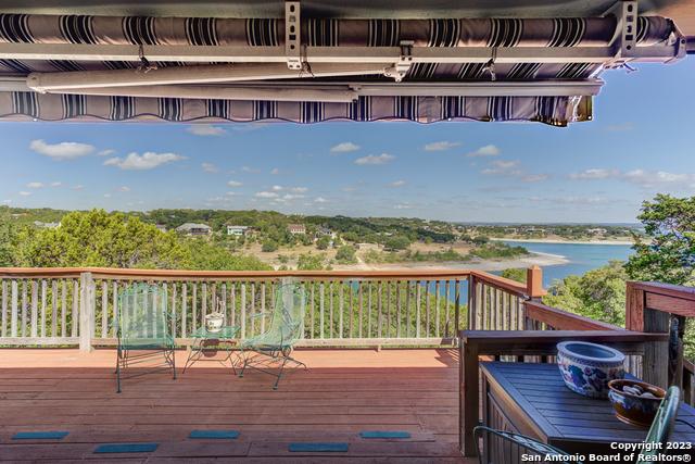 deck featuring a water view