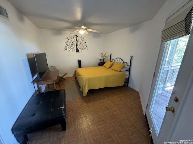 bedroom with ceiling fan, visible vents, baseboards, and access to exterior