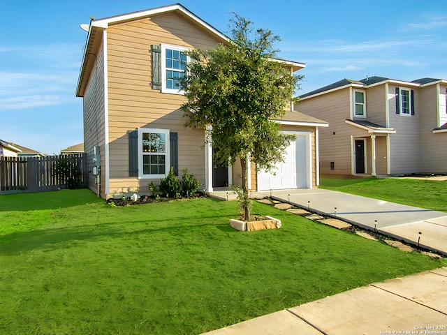 view of front facade featuring concrete driveway, a front yard, and fence