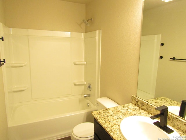 full bathroom with a textured wall, toilet, vanity, and shower / tub combination