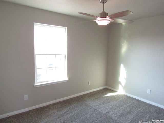 empty room with baseboards, carpet, and ceiling fan