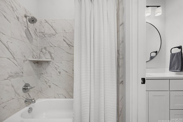 bathroom with shower / bath combo and vanity