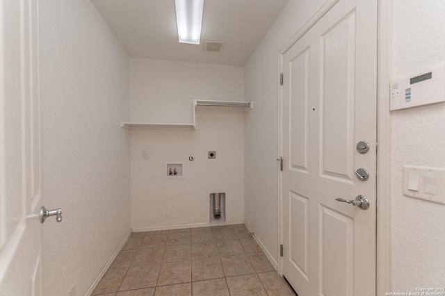 clothes washing area with electric dryer hookup, visible vents, gas dryer hookup, hookup for a washing machine, and laundry area