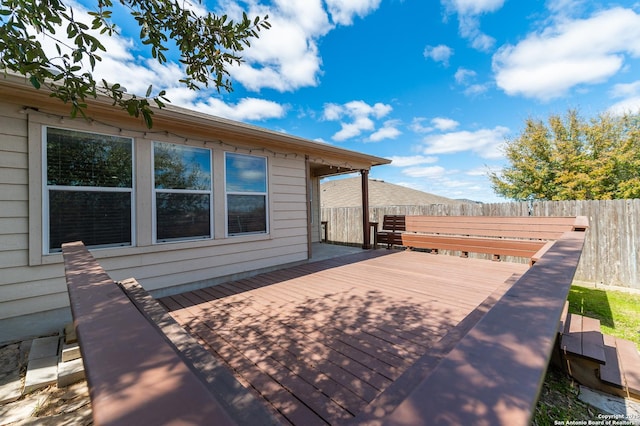 wooden terrace with fence