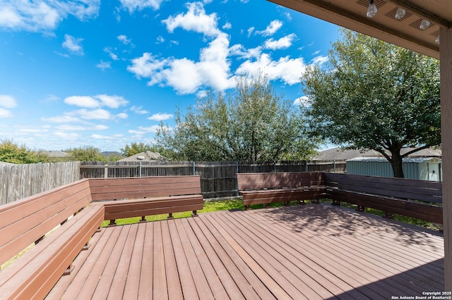 deck featuring a fenced backyard