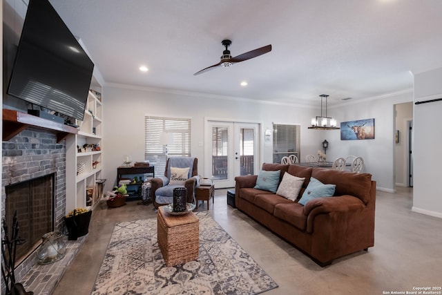 living room with baseboards, ornamental molding, recessed lighting, a fireplace, and ceiling fan with notable chandelier