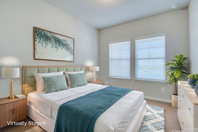 11583 Cottage Pt, San Antonio, TX 78254 - bedroom featuring baseboards and light carpet
