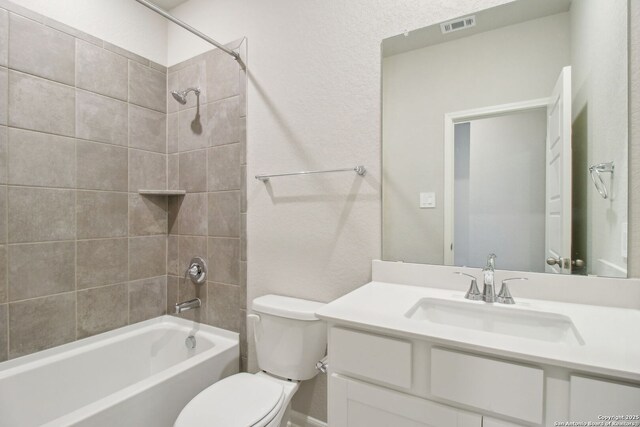 11583 Cottage Pt, San Antonio, TX 78254 - full bathroom featuring vanity, visible vents, shower / bathing tub combination, and toilet