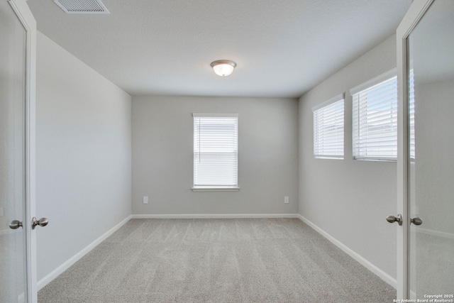 11583 Cottage Pt, San Antonio, TX 78254 - carpeted spare room featuring visible vents and baseboards