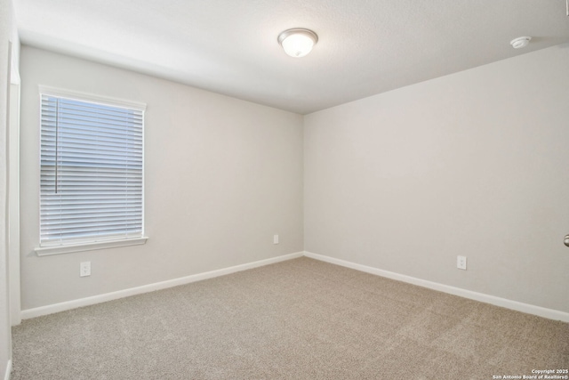 11583 Cottage Pt, San Antonio, TX 78254 - carpeted empty room with baseboards