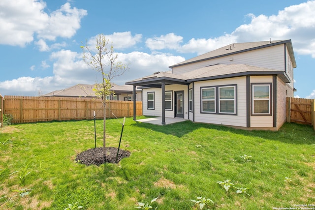 11583 Cottage Pt, San Antonio, TX 78254 - back of house featuring a yard, a patio, and a fenced backyard
