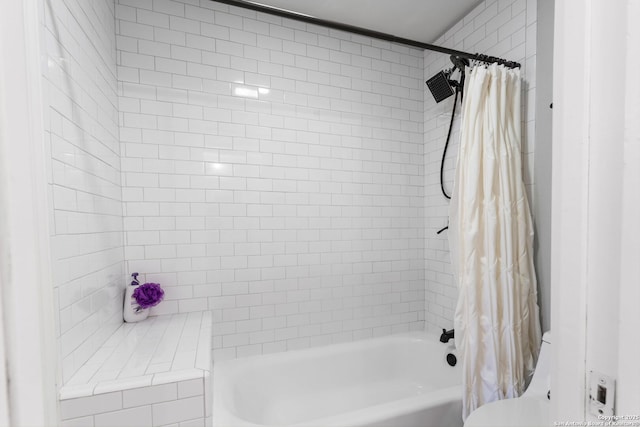 full bathroom featuring shower / bathtub combination with curtain