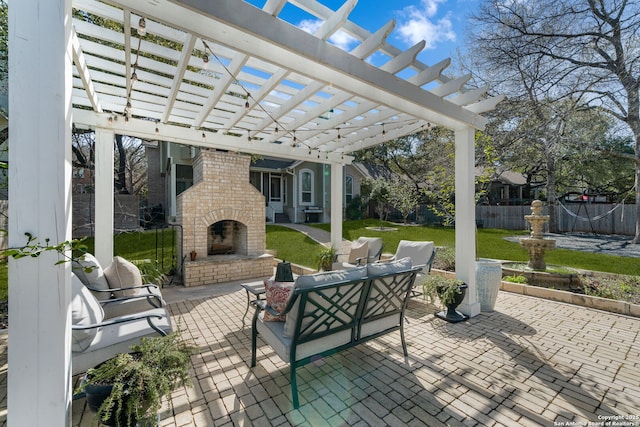 view of patio with a fenced backyard, a pergola, and an outdoor brick fireplace