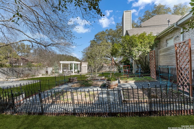 exterior space with fence and a pergola