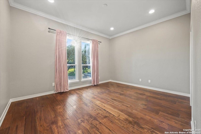 empty room featuring recessed lighting, ornamental molding, baseboards, and wood-type flooring