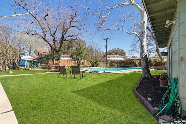 view of yard featuring a fenced backyard and a fenced in pool