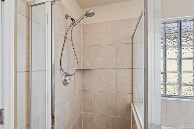 full bathroom featuring a stall shower