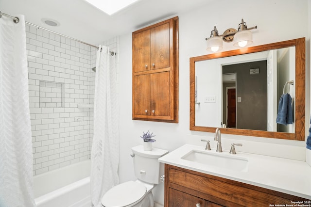 full bathroom with shower / bath combination with curtain, toilet, and vanity