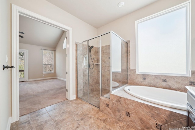 full bath with vanity, baseboards, a shower stall, tile patterned floors, and a bath