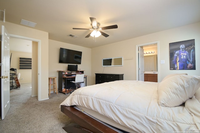 bedroom with visible vents, ensuite bath, carpet, baseboards, and ceiling fan