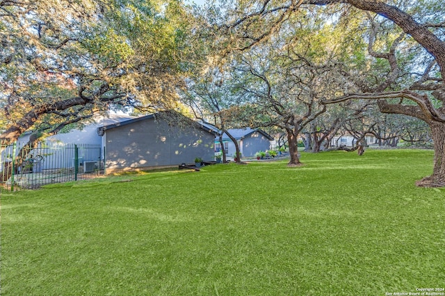 view of yard with fence