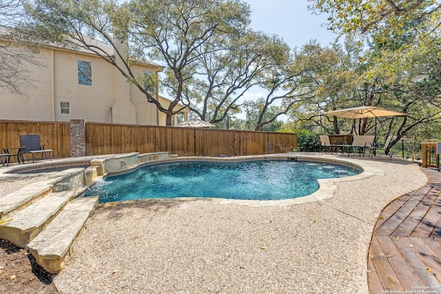 view of pool with a fenced in pool, a patio, and a fenced backyard