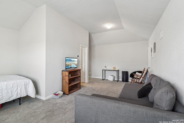 bedroom with visible vents, baseboards, carpet, and lofted ceiling